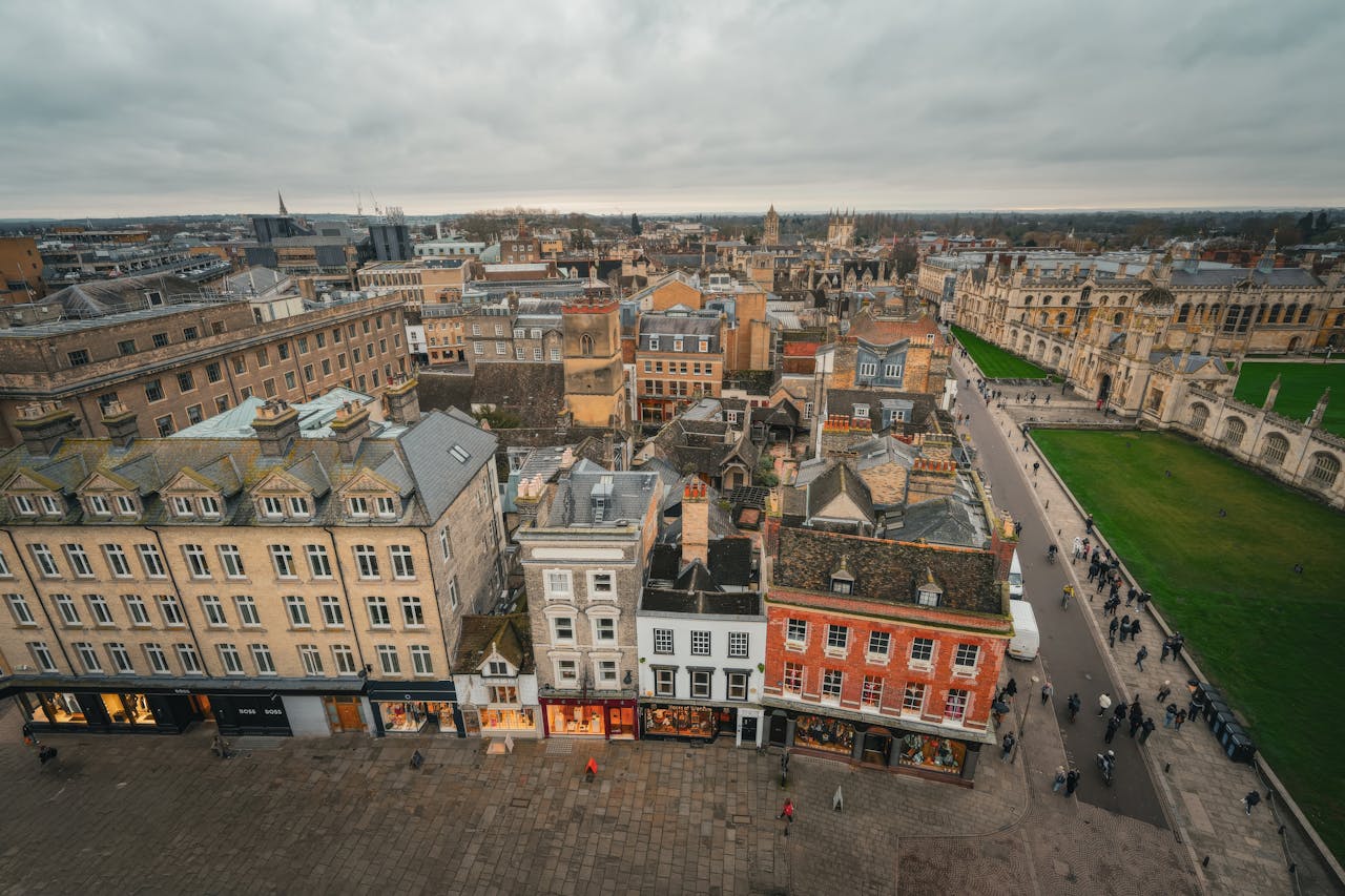 Aerial perspective showcasing Oxford's iconic architecture and bustling streets.